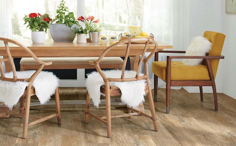 wood look tile flooring in a dining room